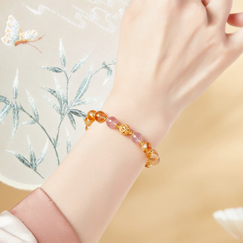 Supplier model wearing the yellow and pink beaded silver bracelet