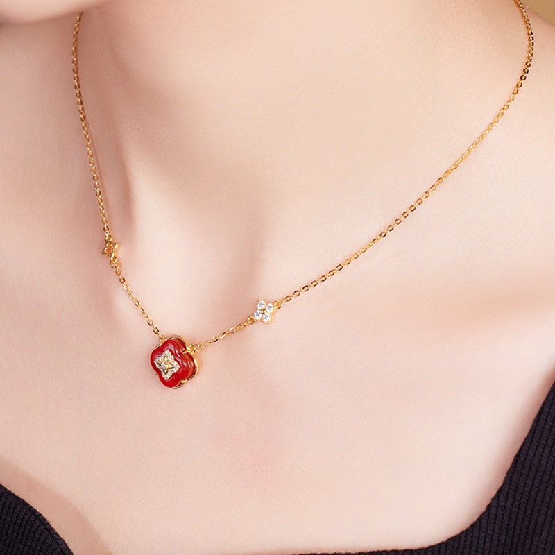 Supplier model wearing the clover necklace, close view
