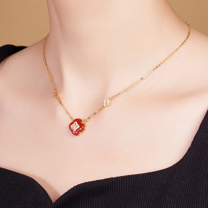 Supplier model wearing the clover necklace, side view