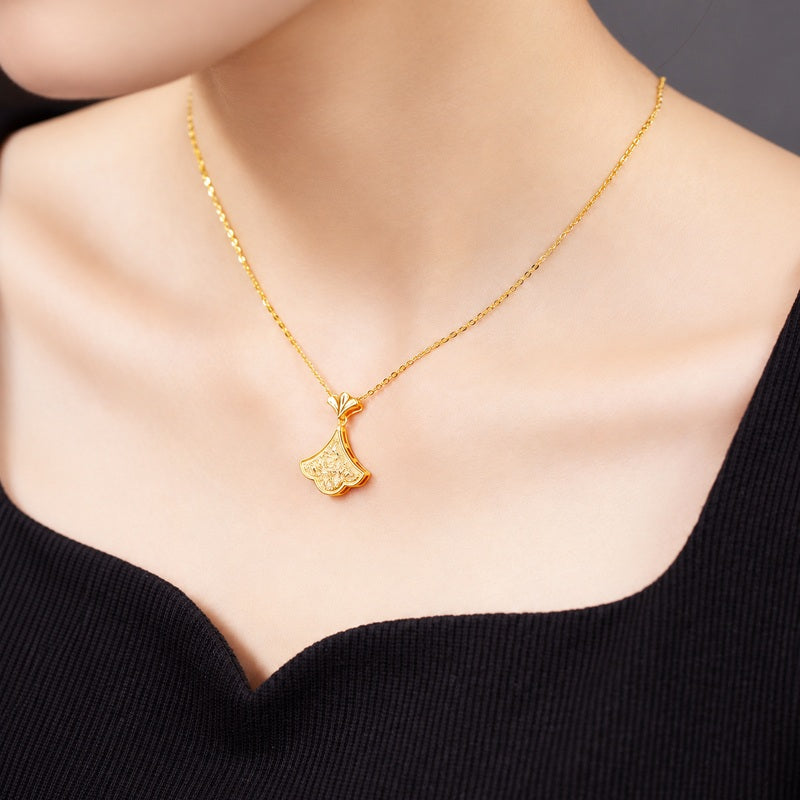 Alternate supplier model view showing the pendant at the neckline
