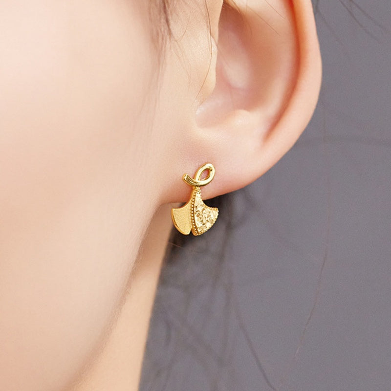 Supplier model wearing the ginkgo leaf stud earring