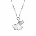 Ginkgo leaf necklace on white showing the pearly leaf, engraved silver leaf and fine oval-link chain