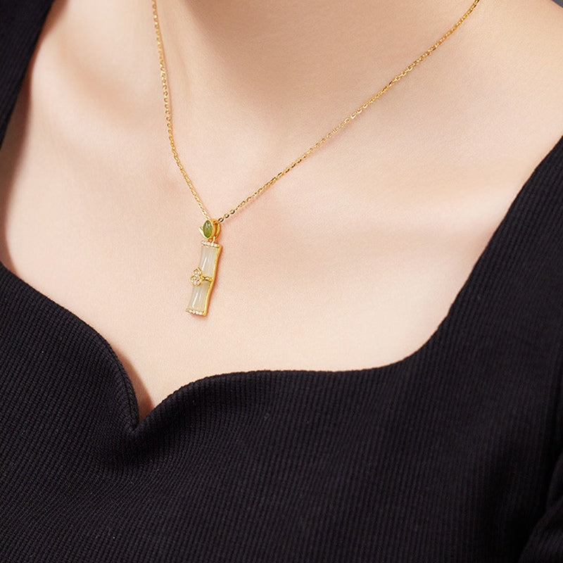 Supplier model wearing the jade bamboo gourd necklace