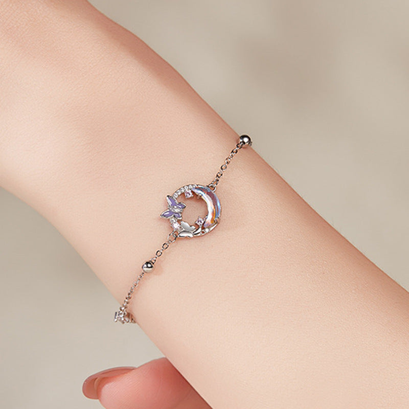 Original model wearing the butterfly moon bracelet