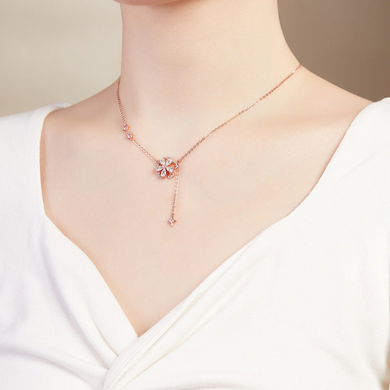 Supplier model wearing the necklace from an angled view