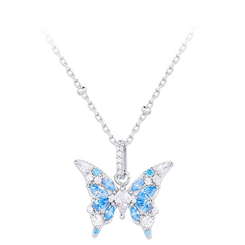 Original blue butterfly necklace on a white background