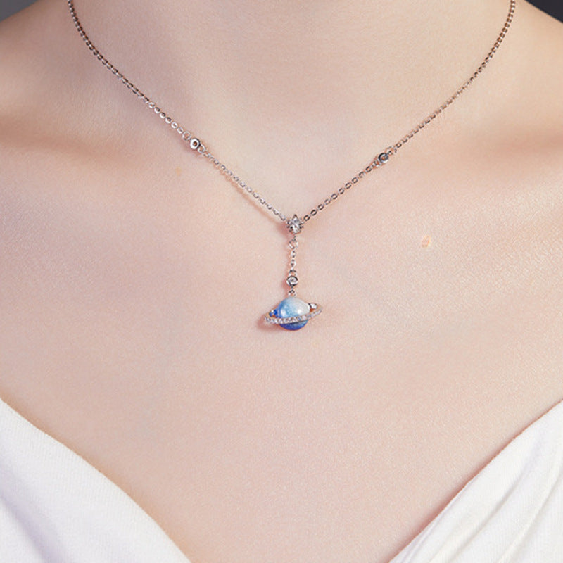 Supplier model wearing the blue planet silver necklace