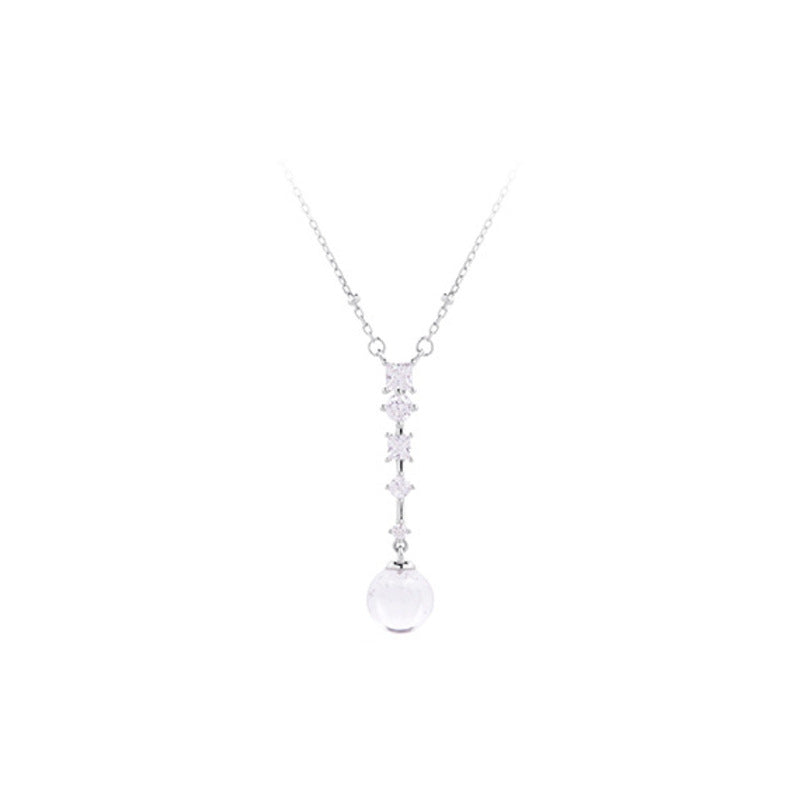 Clear quartz silver drop necklace on white