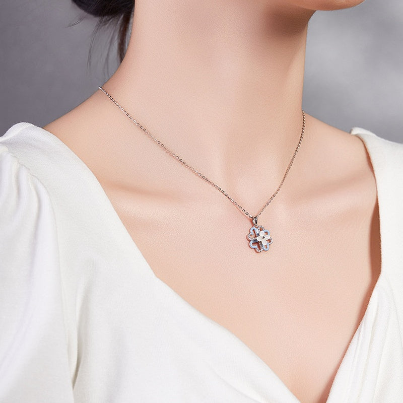 Original side-angle model wearing the clover necklace