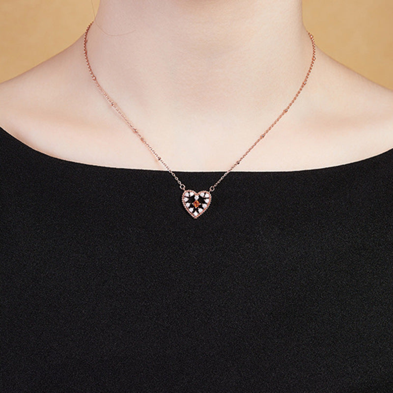 Original model wearing the heart necklace