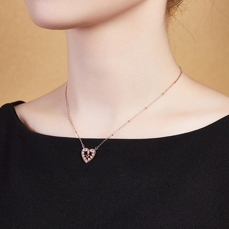 Side view of the original model wearing the necklace
