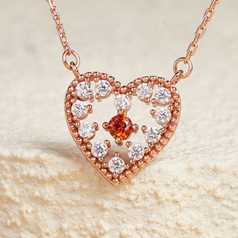 Polished heart pendant with clear cubic zirconia