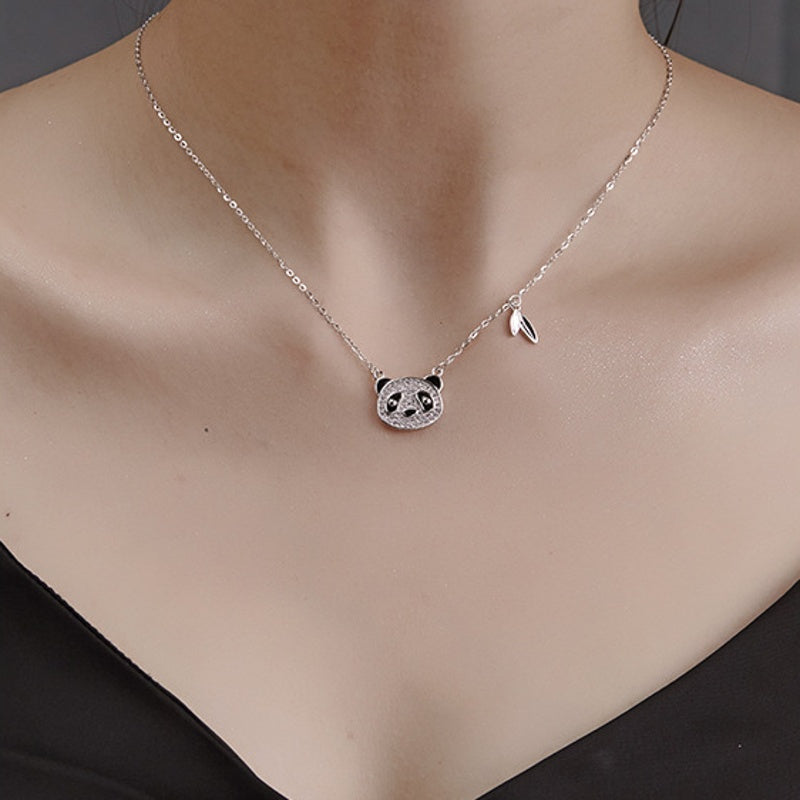 Original model wearing the panda silver necklace
