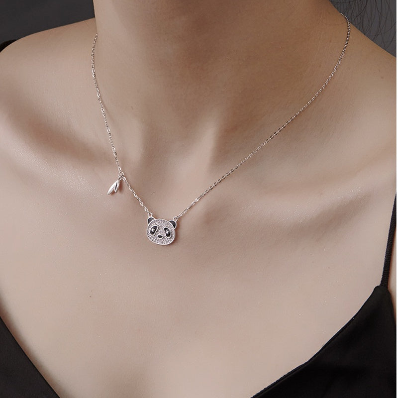 Angled model view of the panda necklace
