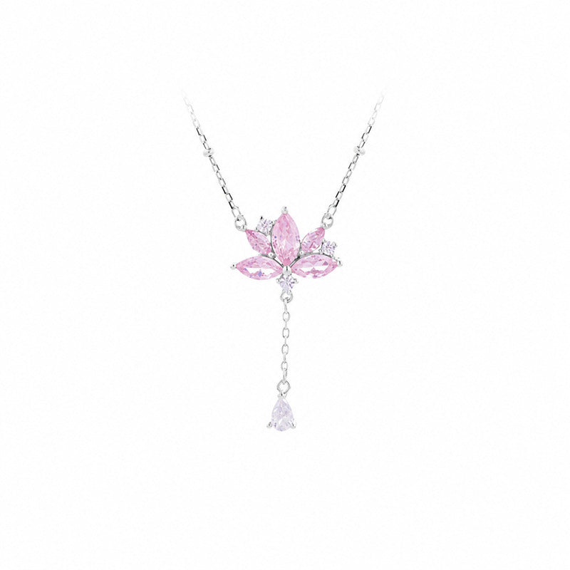 Pink lotus necklace on white background