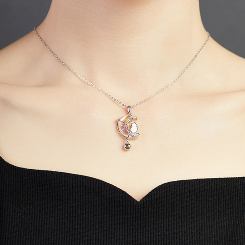 Model wearing the cat moon necklace