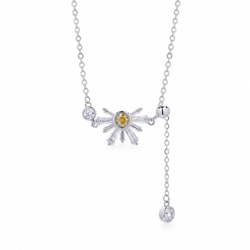 Daisy silver tassel necklace on white