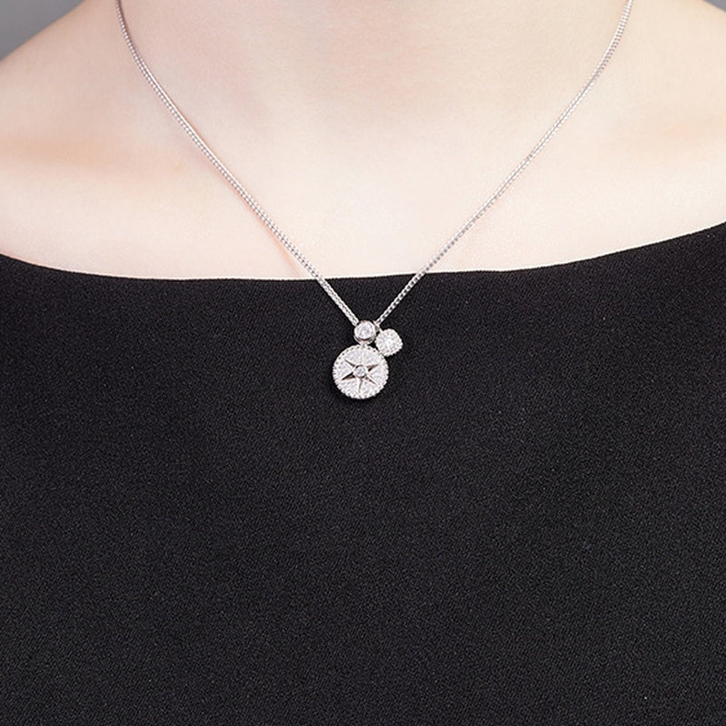 Original model wearing the star compass silver necklace