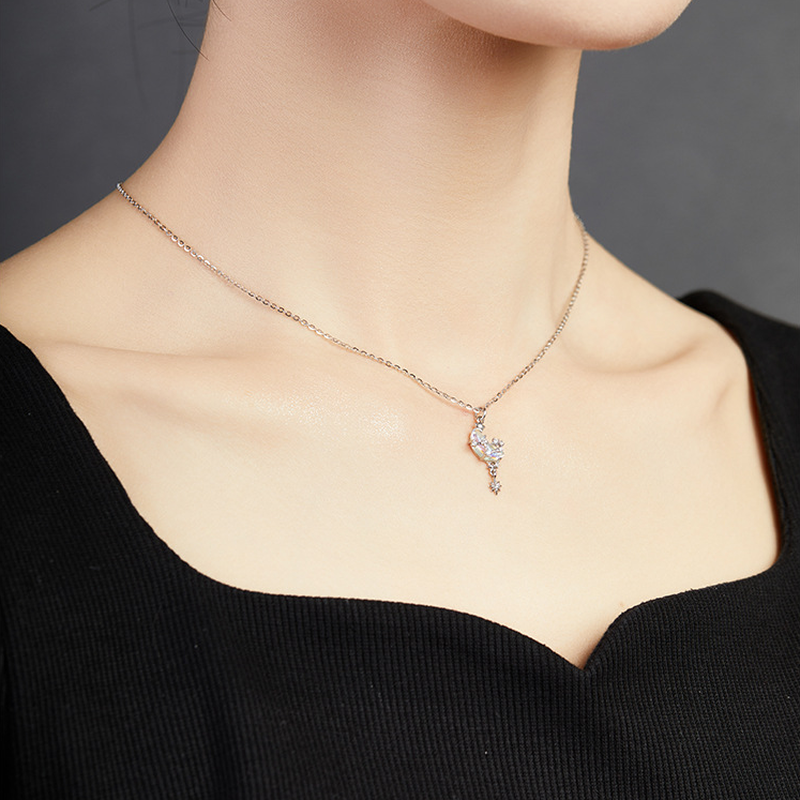 Original model wearing the necklace, angled neckline view