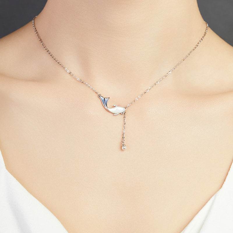 Original model wearing the whale and pearl drop necklace