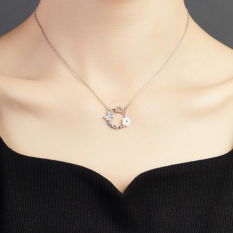 Original model wearing the crown wreath necklace