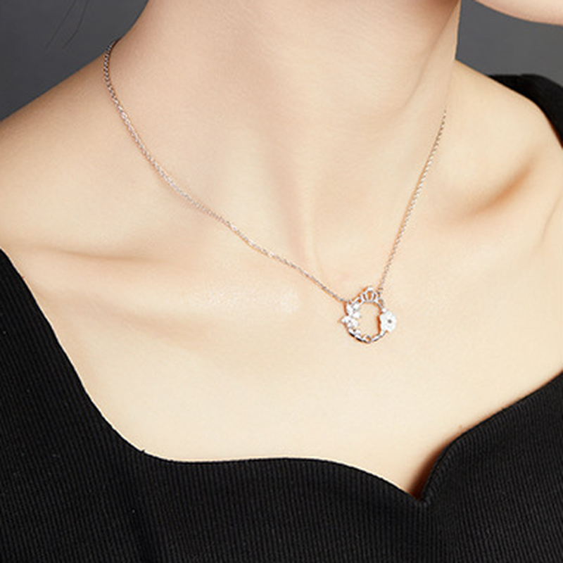 Original angled model photograph of crown wreath necklace