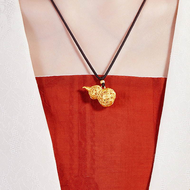 Original model wearing the filigree gourd necklace
