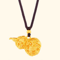 Original filigree gourd pendant on a light background