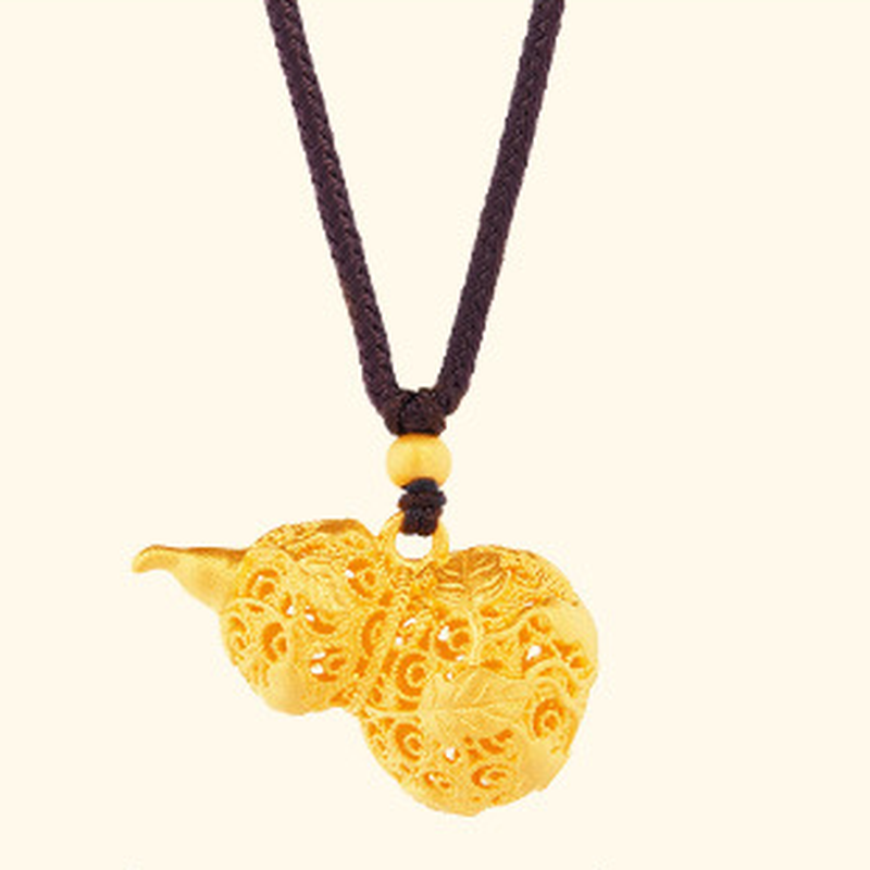 Original filigree gourd pendant on a light background