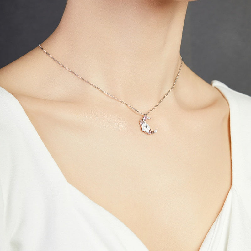 Supplier model wearing the necklace from an angle