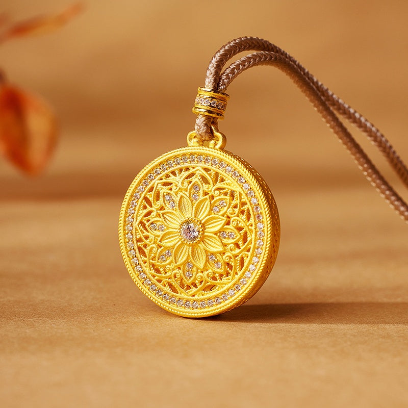 Sunflower pendant resting on a warm surface