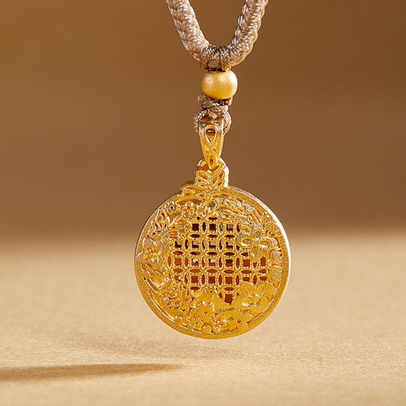Reverse of the butterfly medallion showing traditional openwork detail
