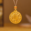 Eight Treasures pendant against a warm brown background