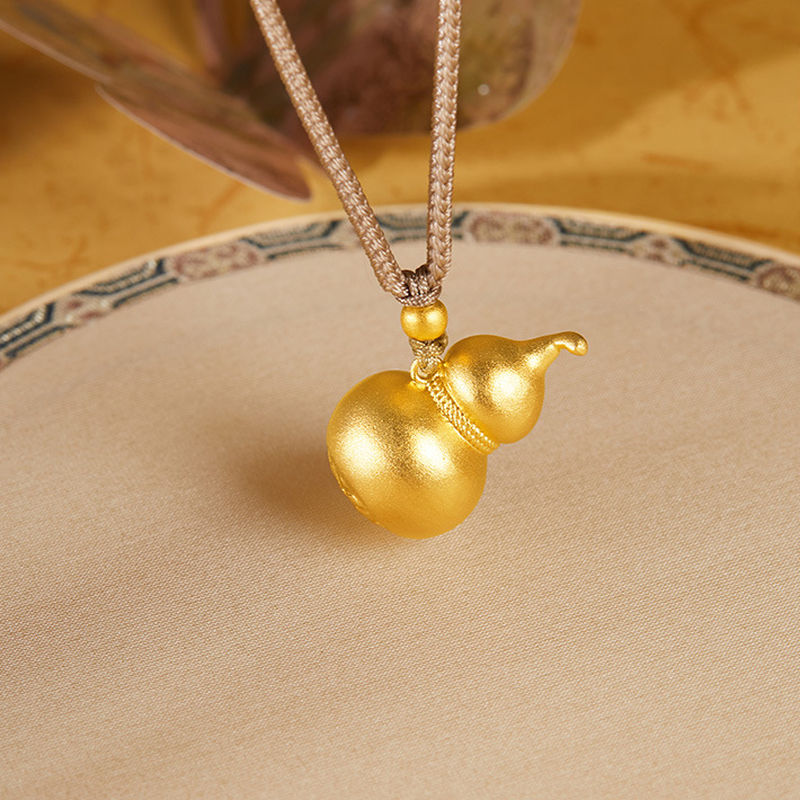 Style 1 gourd pendant with light cord over a cream dish