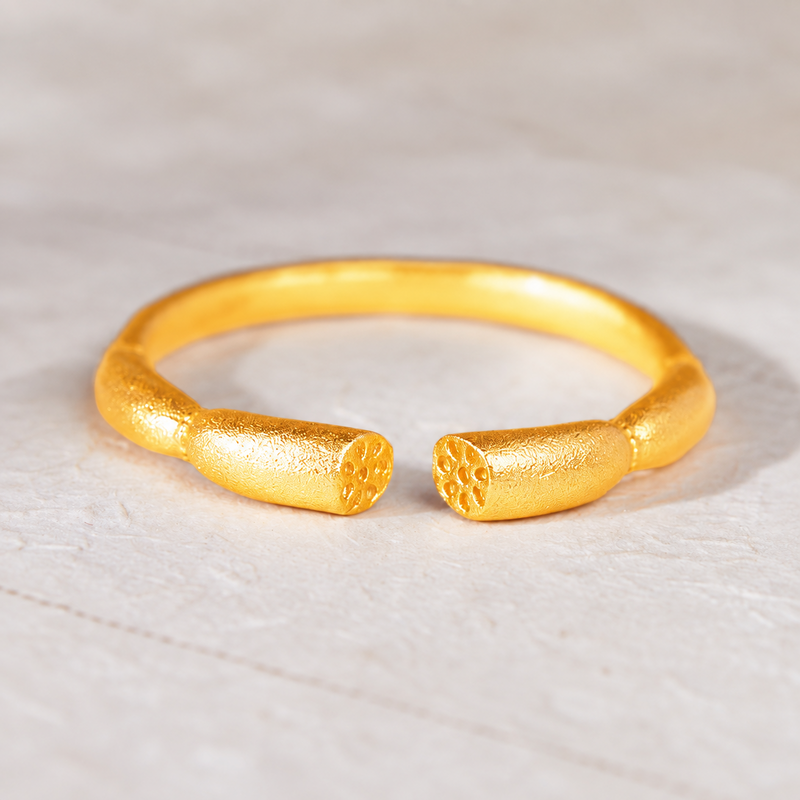 Lotus root open ring on pale stone background