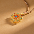 Orchid filigree necklace on warm textured background