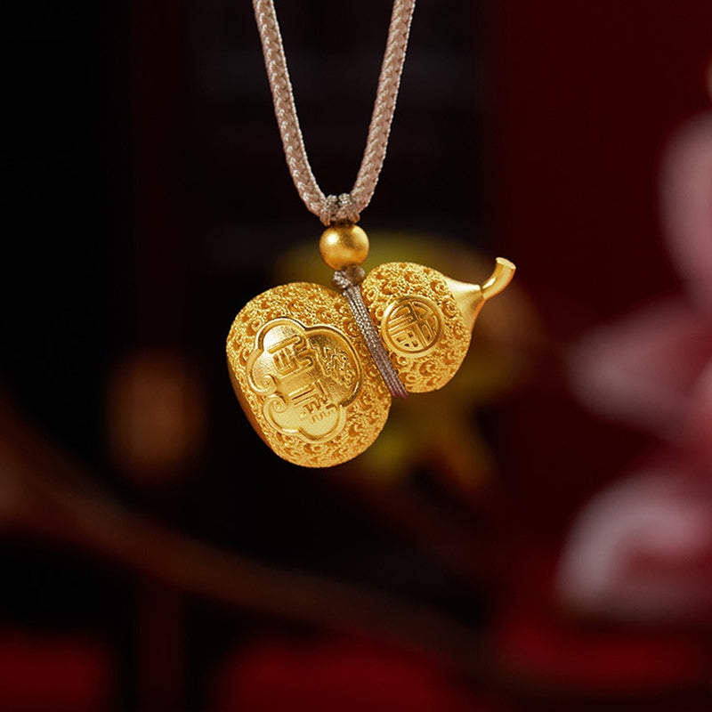Suspended openwork gourd pendant with auspicious motifs