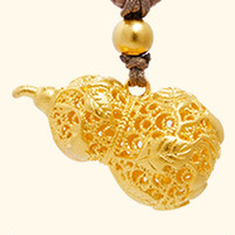 Original filigree gourd pendant detail on cream