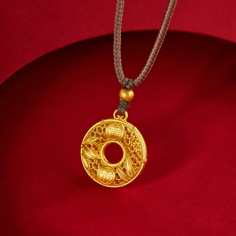 Gold-colored filigree bamboo blessing peace buckle suspended against a red background