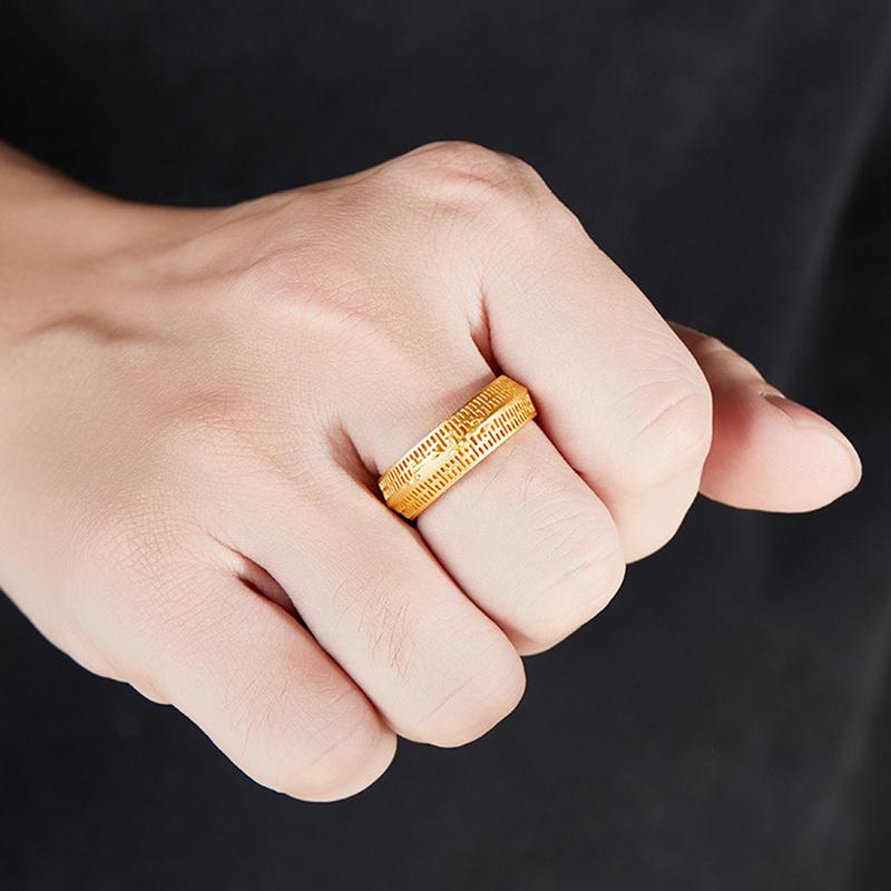 Original model wearing the dragon ring with a closed hand
