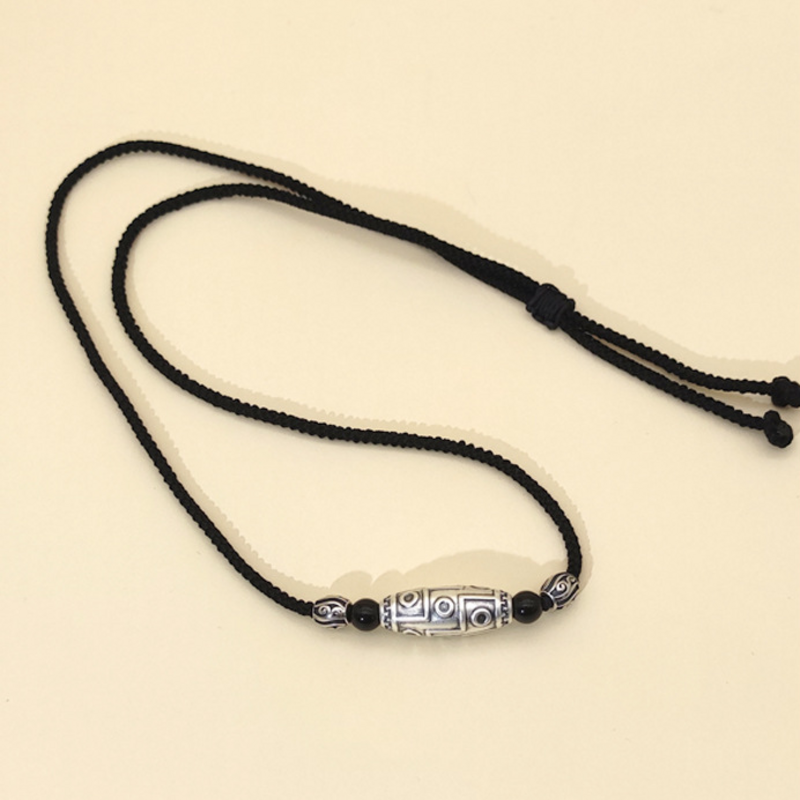 Adjustable braided cord necklace with sliding knot