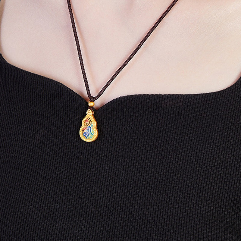Original model wearing the enamel landscape gourd necklace