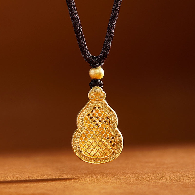 Openwork reverse of the gold-plated gourd pendant