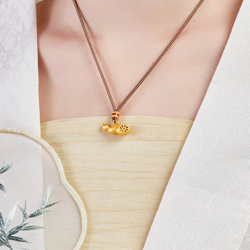 Supplier model showing the lotus-root necklace beside an embroidered fan