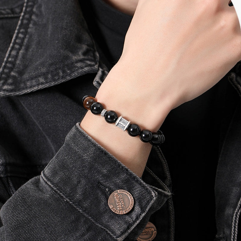 Supplier model wearing the obsidian mantra bracelet