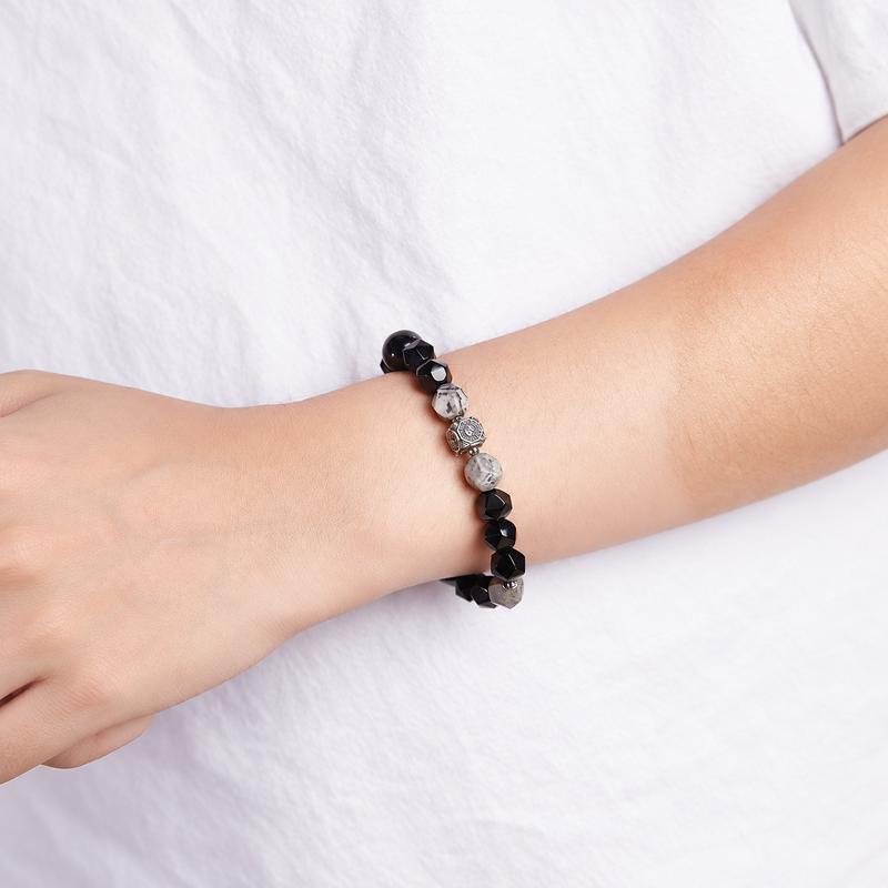 Supplier model wearing the map stone and obsidian Bagua bracelet