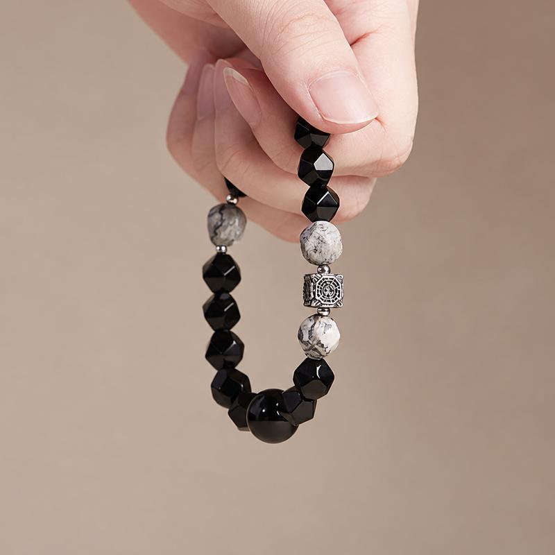 Hand-held view of the original Bagua bracelet