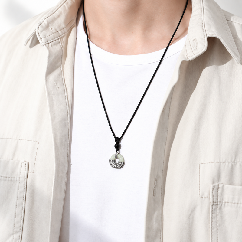 Supplier model wearing the nephrite jade peace buckle on a braided cord