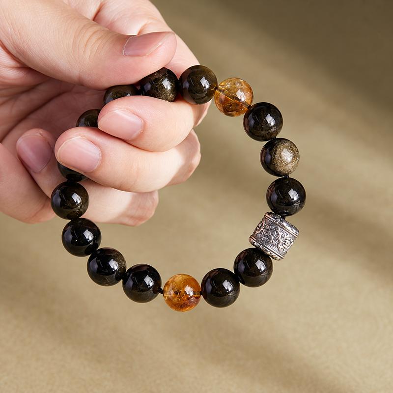 Original hand-held view of the obsidian bracelet