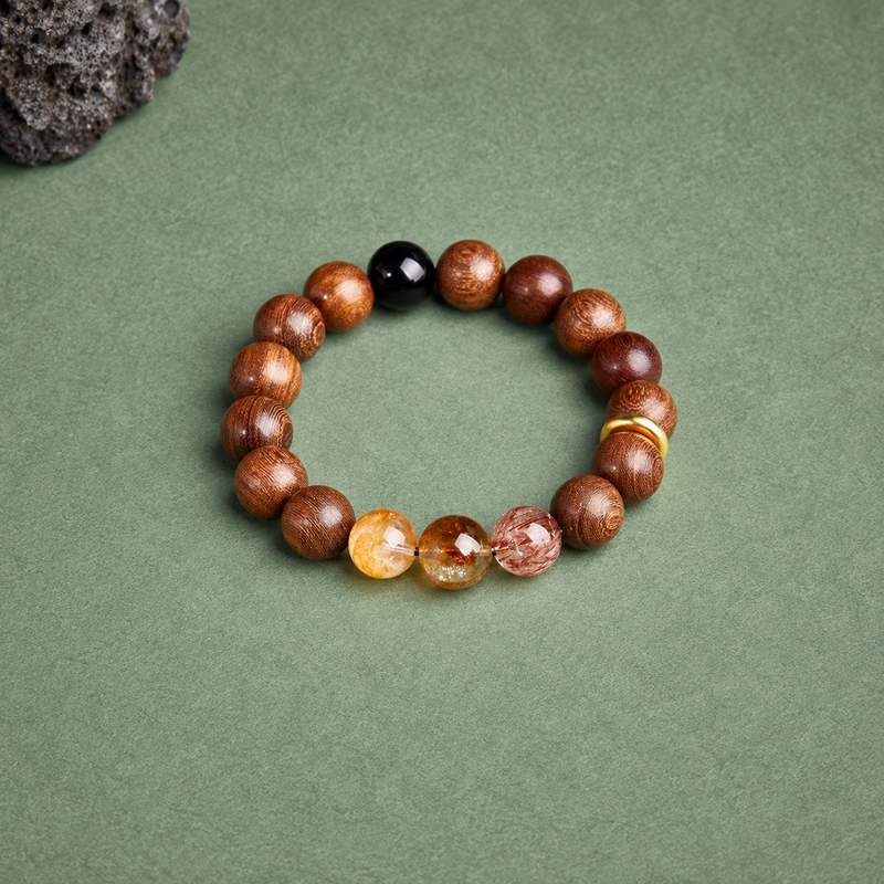 Overhead view showing Golden Silk Wood, obsidian, three crystal accents and the peace buckle